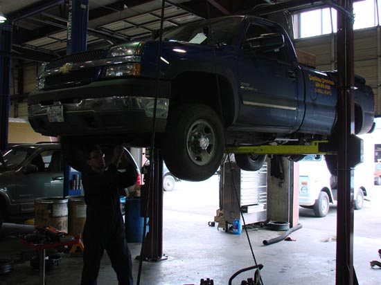279_Chevy_1500HD_pickup_truck_on_hoist_for_new_engine