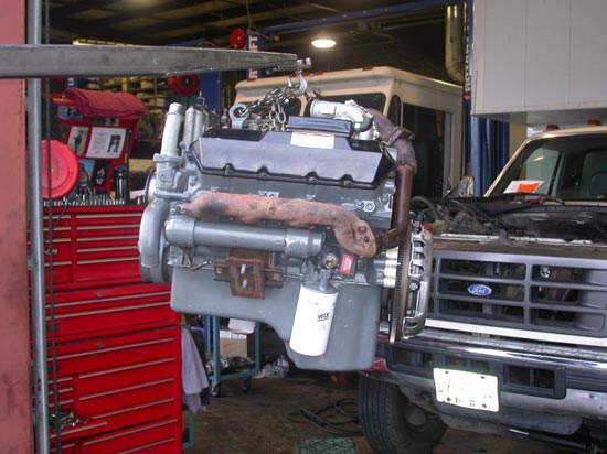 16_remanufactured_Ford_V_motor_on_hoist