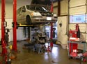 55_Chev_minivan_rebuilt_V6_engine_on_lift