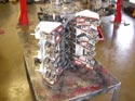 49_Chevrolet_minivan_V6_engine_on_workbench_closeup